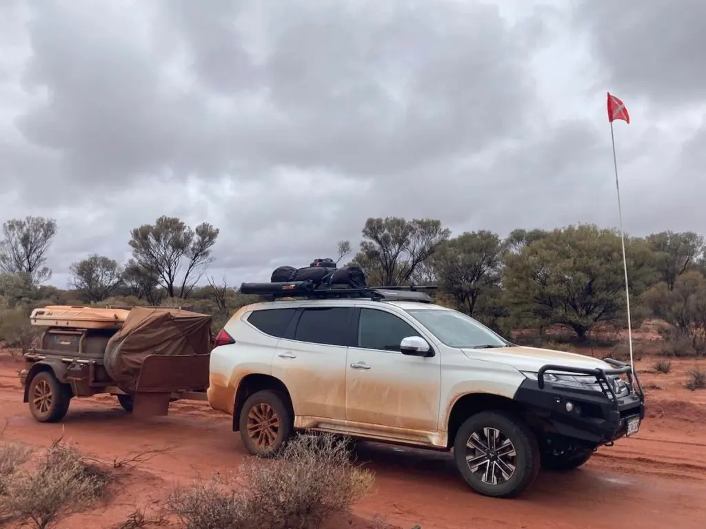 A 4WD towing a Stockman All Roada Pod Trailer through the Australian outback