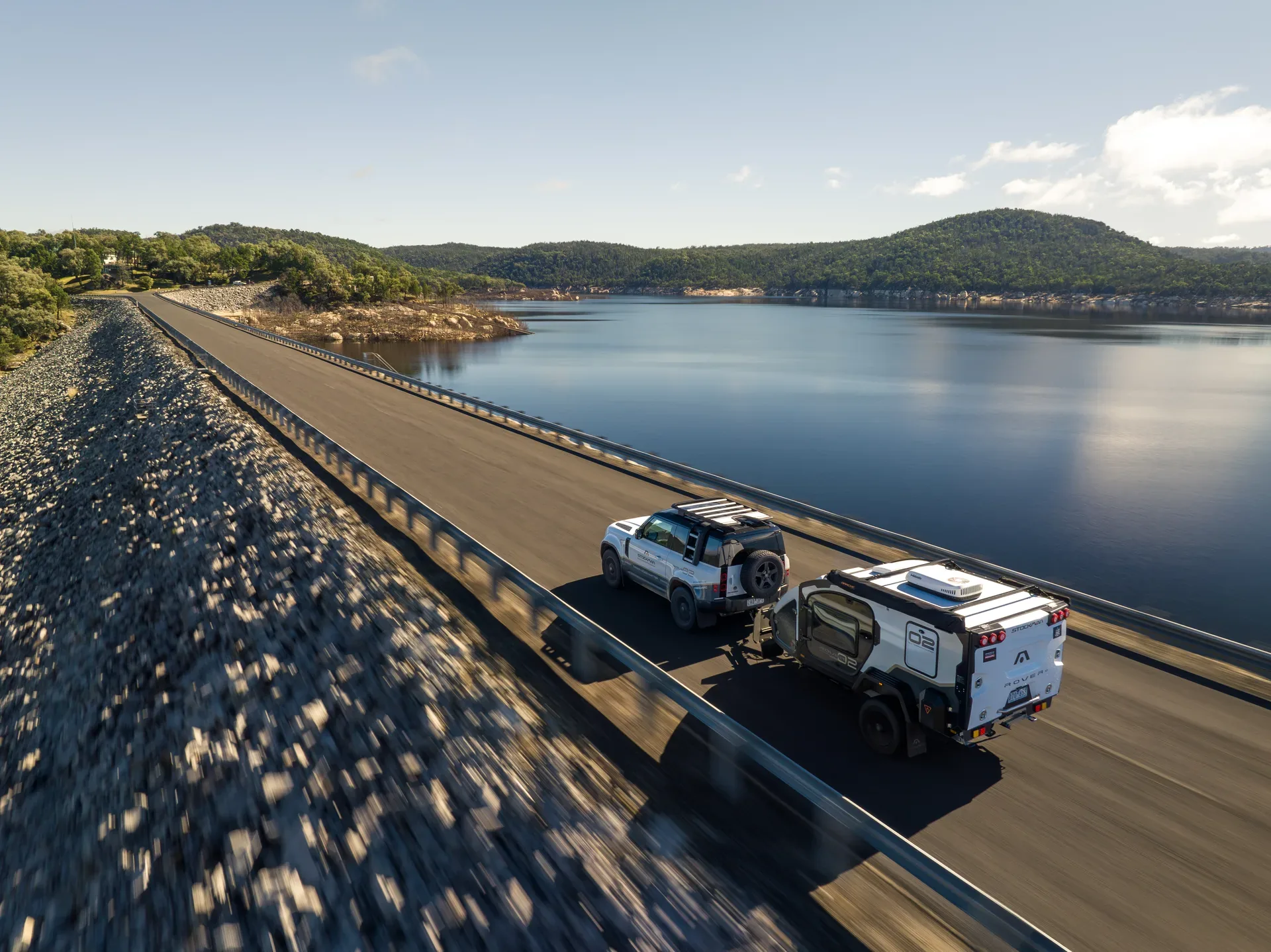 Rover towing on a sealed road from above