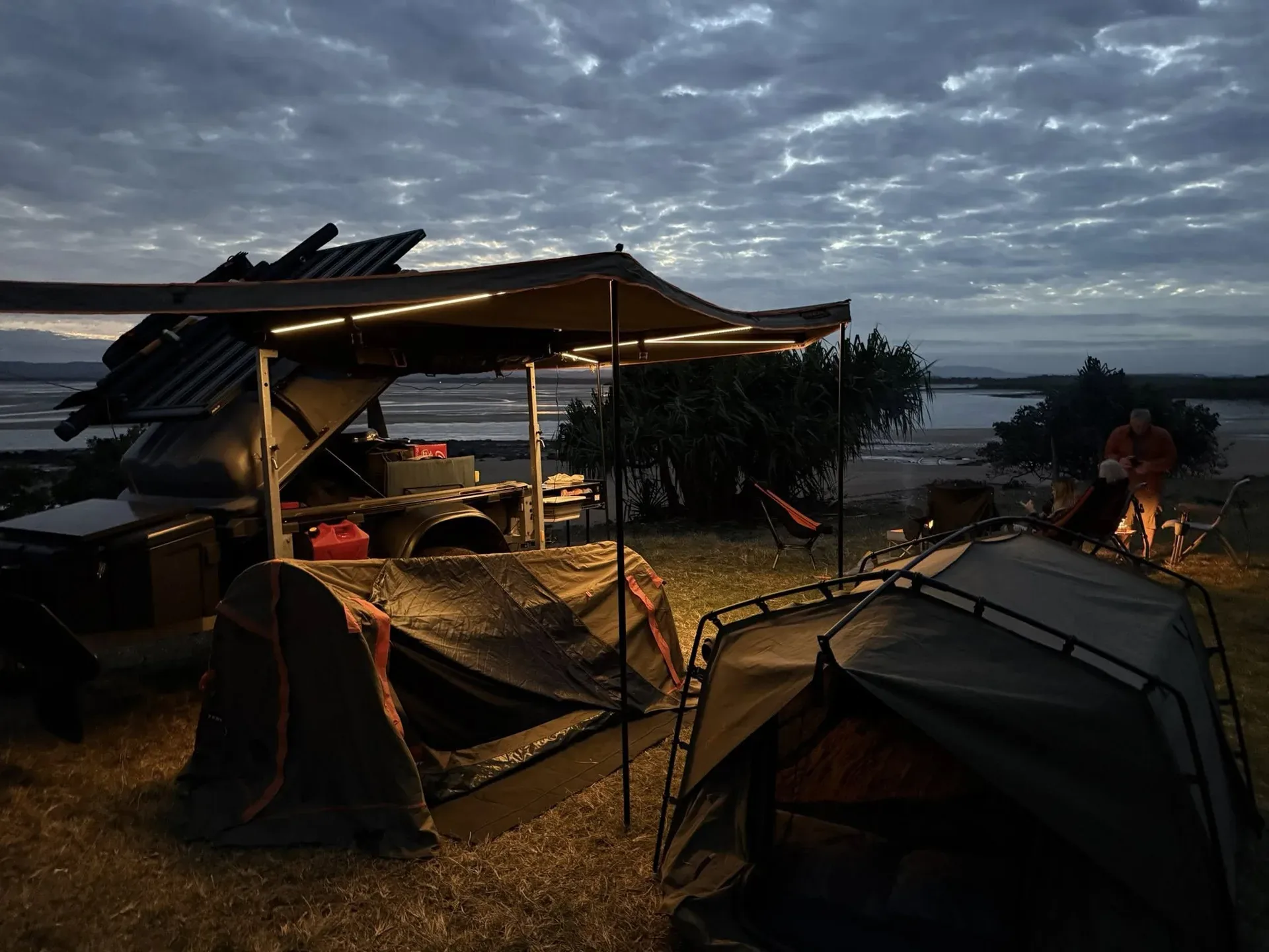 Awning Camp Setup At Dusk