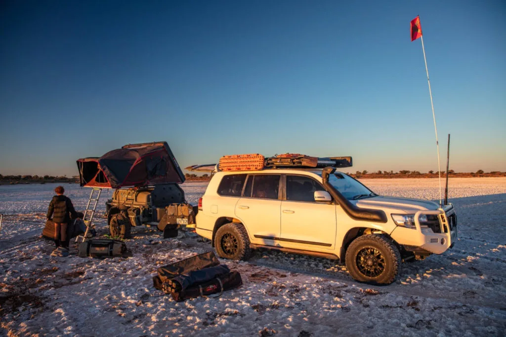 Pod Trailer fitted with roof racks, a kayak and a roof-top tent