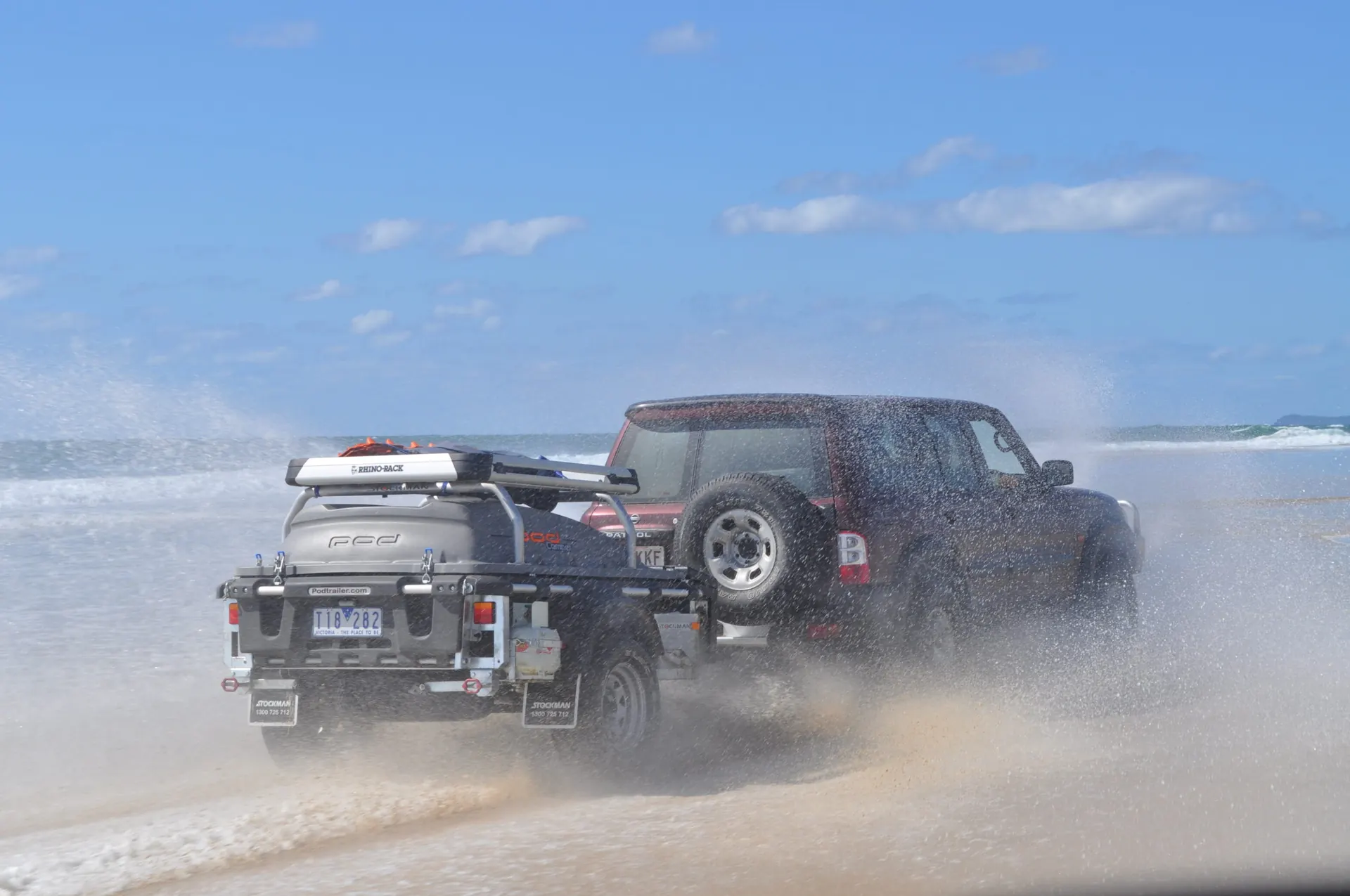 Stockman Pod Trailer towed through the surf at Fraser Island