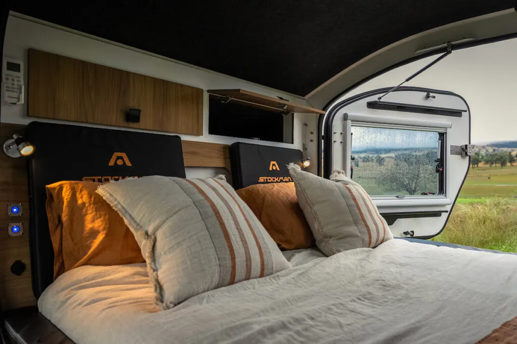 Inside the Stockman Rover insulated cabin with queen inner-spring bed