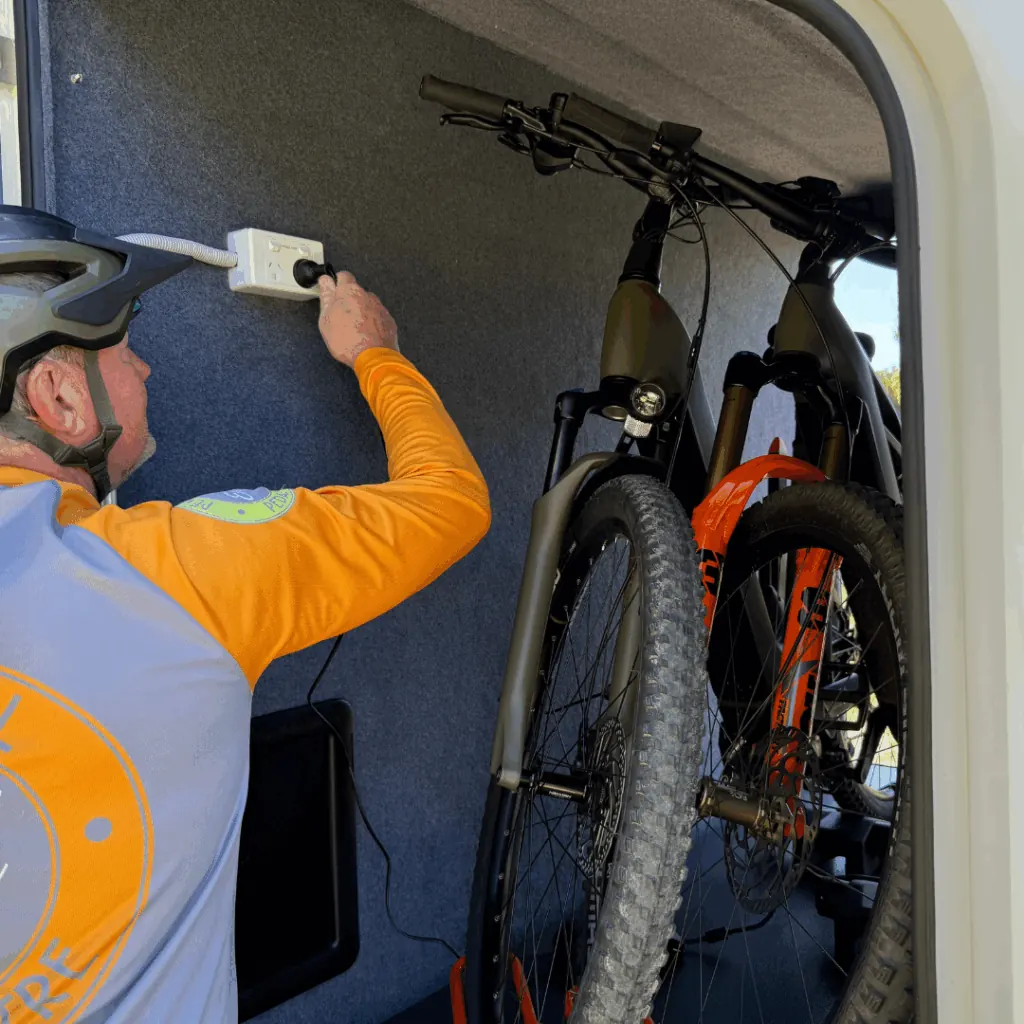 Two e-bikes secured inside the Trekka fibreglass nosecone toolbox