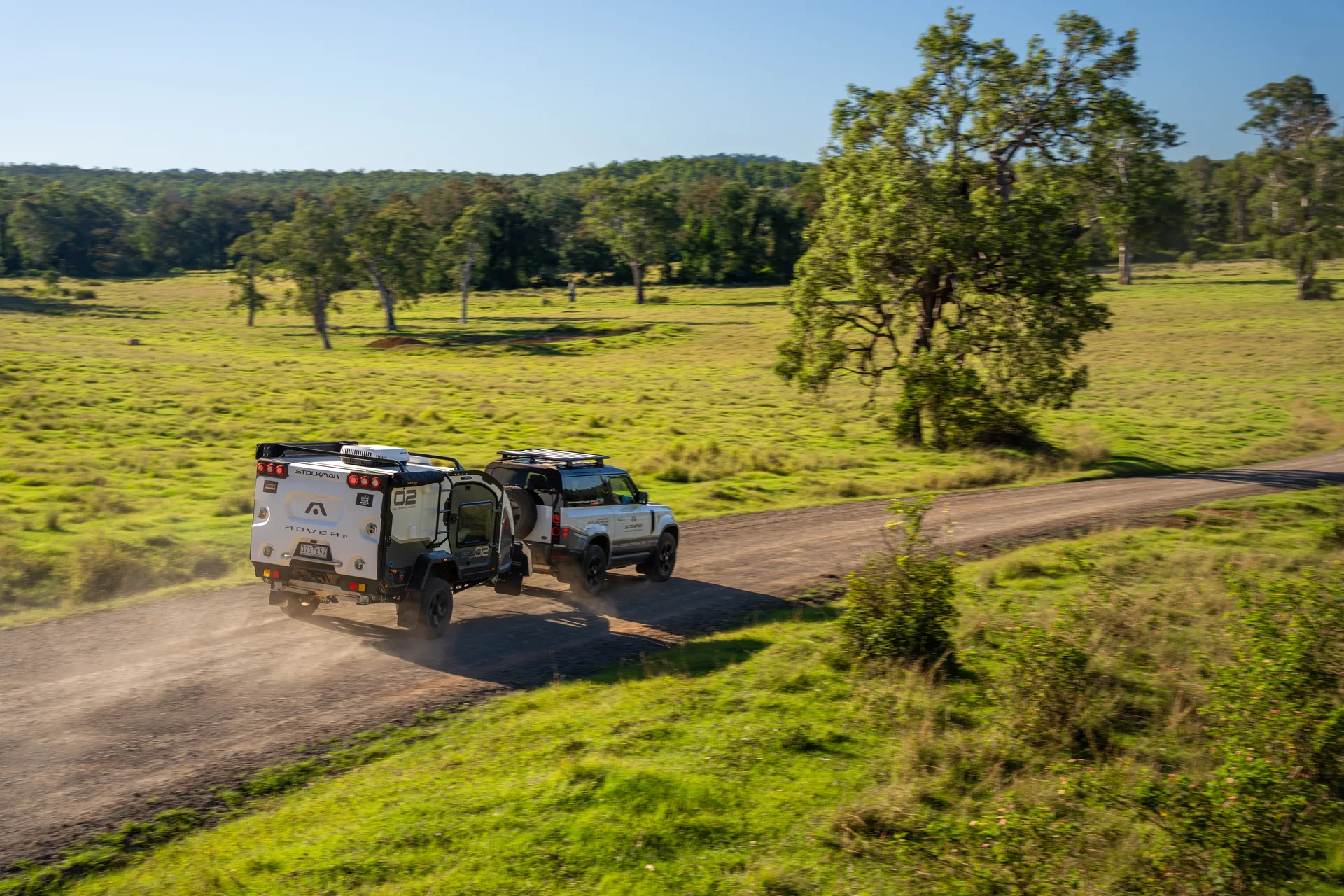 A Stockman Rover being towed along a gravel road